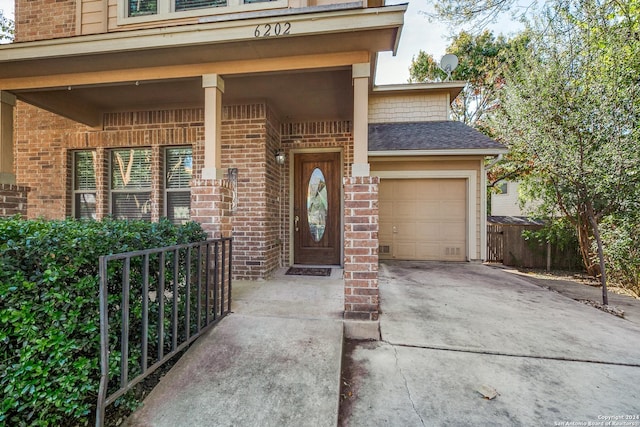 entrance to property featuring a garage