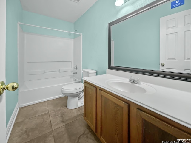 full bathroom featuring tile patterned floors, vanity, toilet, and shower / tub combination