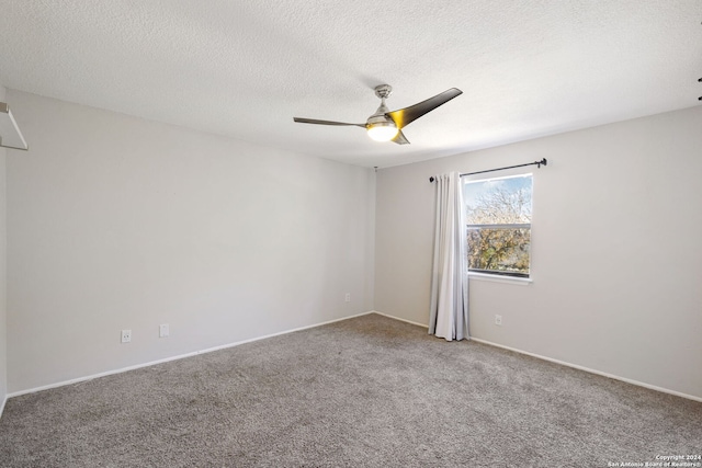 unfurnished room with carpet, a textured ceiling, and ceiling fan