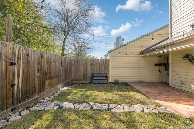 view of yard with a patio area