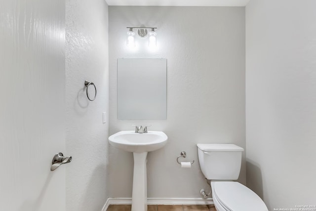 bathroom featuring toilet