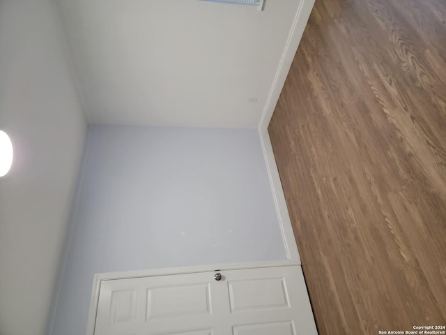 unfurnished room featuring wood-type flooring