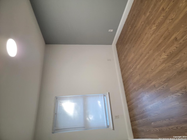 empty room with wood walls