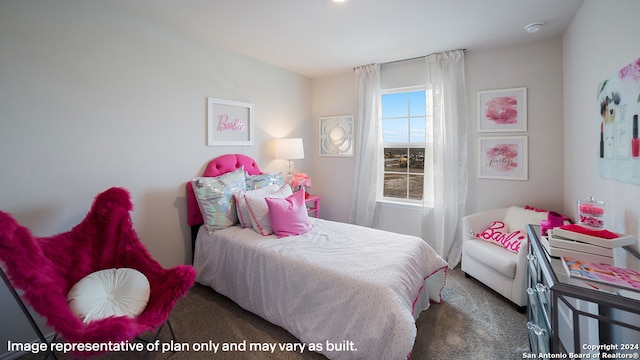 bedroom featuring dark colored carpet