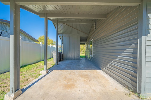 view of patio featuring a carport