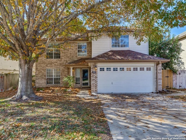 view of front of property featuring a garage