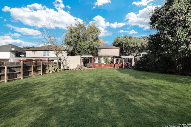 view of yard with a pergola