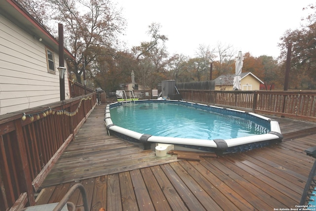 view of pool with a deck