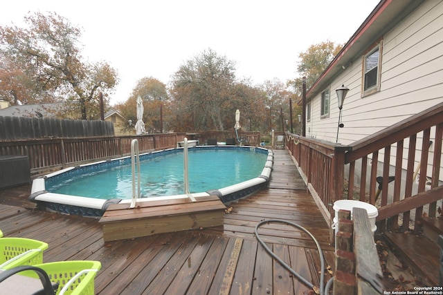 view of pool with a deck