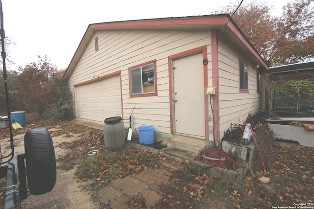 exterior space featuring a garage