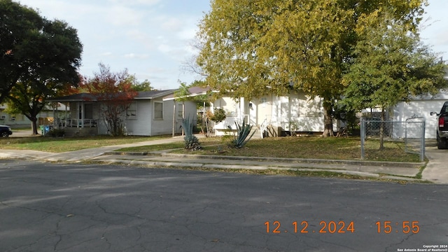 view of property hidden behind natural elements