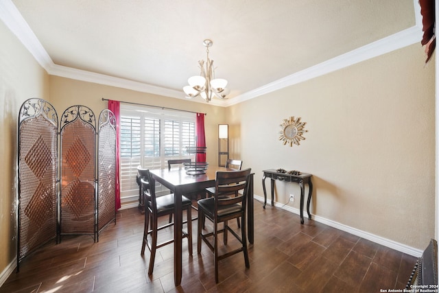 dining room featuring crown molding, dark hardwood / wood-style floors, and an inviting chandelier