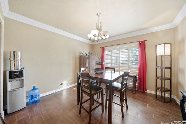 dining room featuring crown molding, dark wood-type flooring, and an inviting chandelier