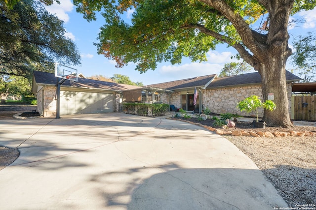 ranch-style house featuring a garage