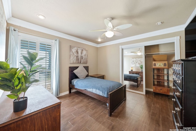 bedroom with dark hardwood / wood-style flooring, a closet, ornamental molding, and ceiling fan