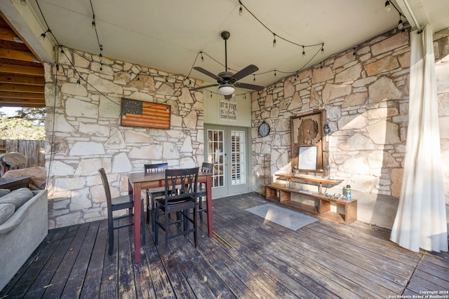 wooden terrace featuring ceiling fan and french doors