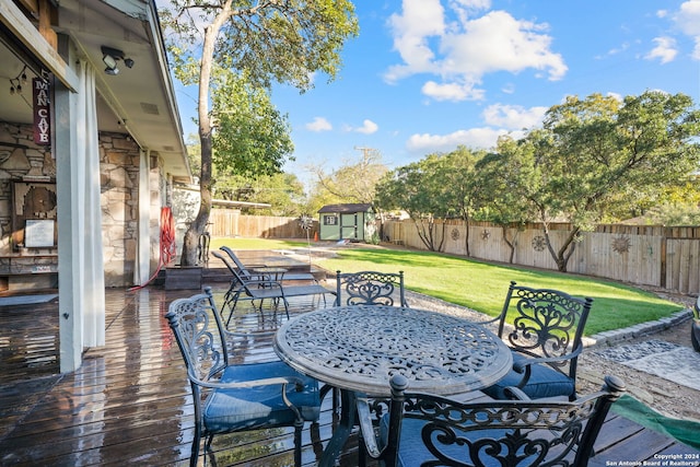 view of patio featuring a storage unit