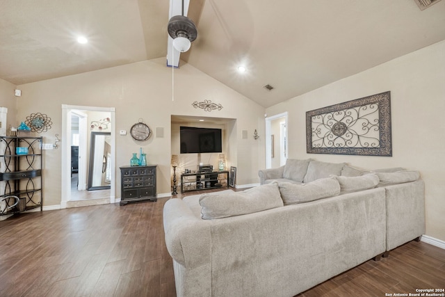 living room featuring high vaulted ceiling and dark wood-type flooring