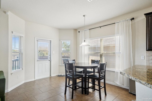 view of tiled dining space