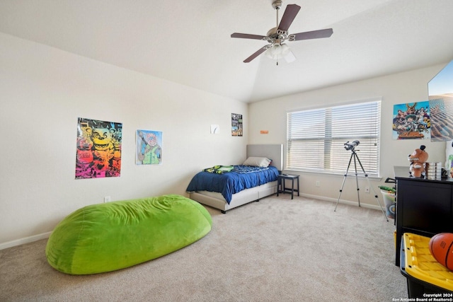 bedroom featuring carpet flooring, ceiling fan, and vaulted ceiling