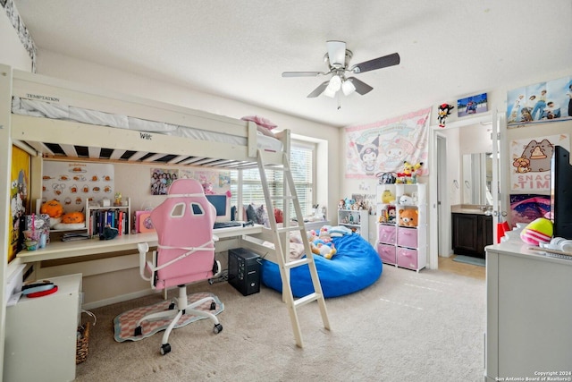 bedroom with light carpet, a textured ceiling, connected bathroom, and ceiling fan