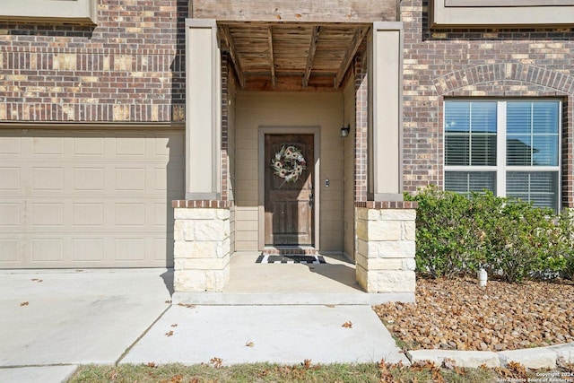 property entrance featuring a garage