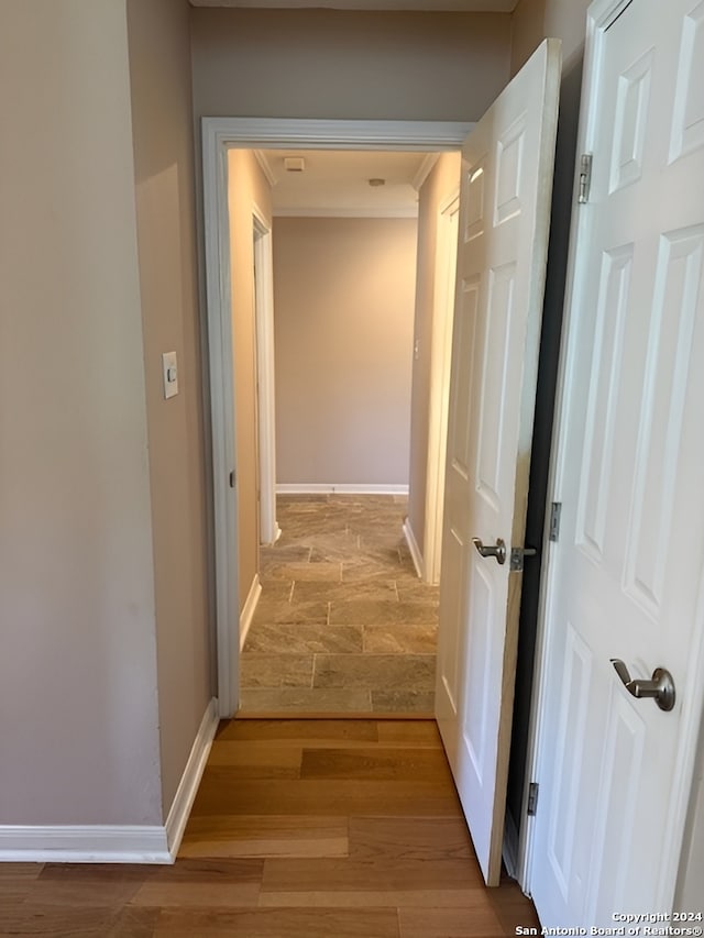 hall with light hardwood / wood-style flooring