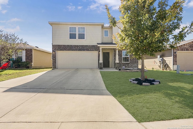 view of front of home with a garage and a front lawn