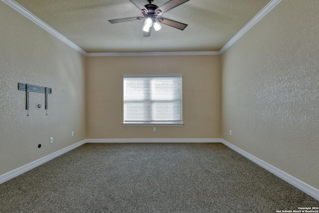 carpeted spare room with a textured ceiling, ceiling fan, and crown molding