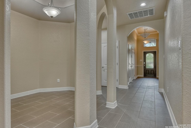 foyer entrance featuring light tile patterned floors