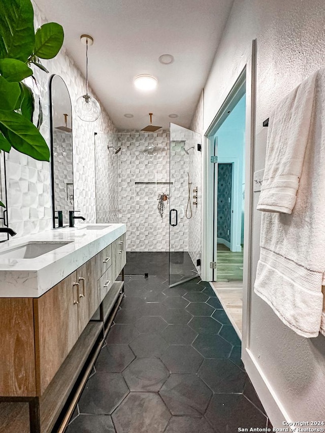 bathroom with vanity, an enclosed shower, wood-type flooring, and vaulted ceiling