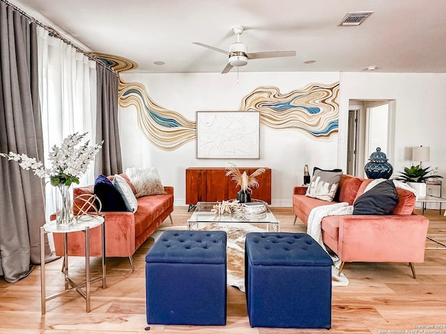 interior space featuring hardwood / wood-style floors and ceiling fan