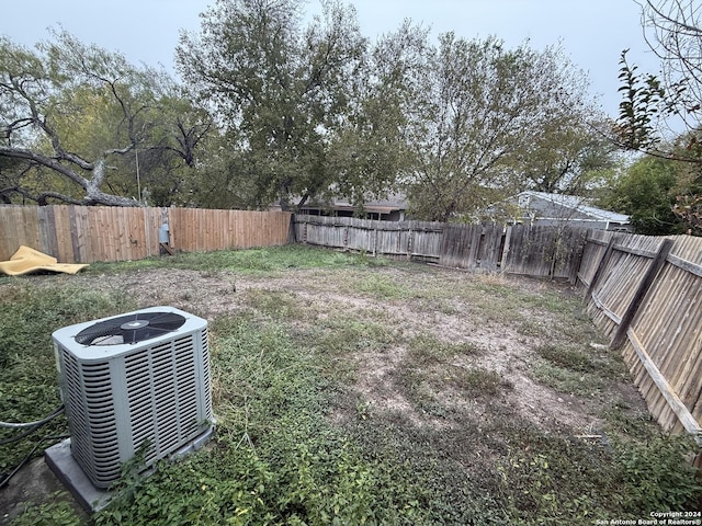 view of yard featuring cooling unit