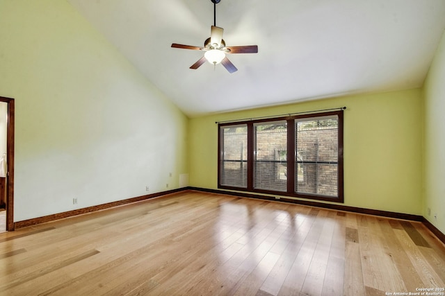 spare room featuring lofted ceiling, ceiling fan, and light hardwood / wood-style floors