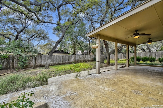 view of patio featuring ceiling fan