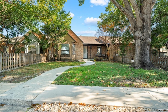 view of front facade with a front yard