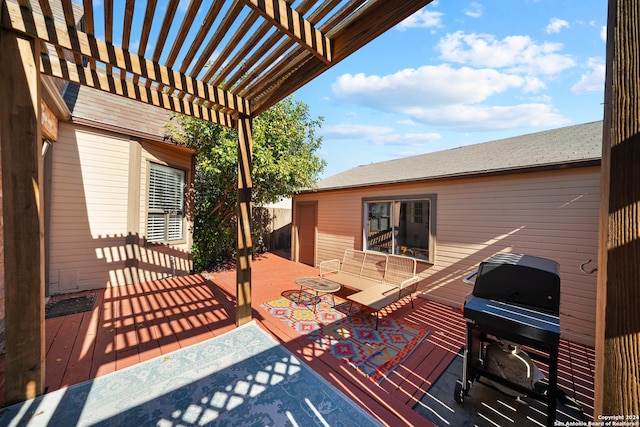 exterior space with a grill, a deck, and a pergola