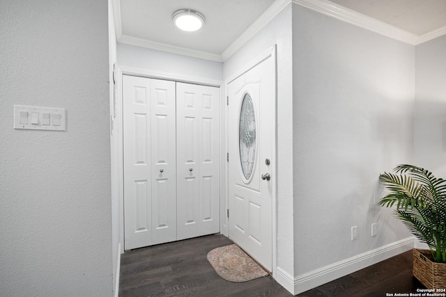 entrance foyer with crown molding and dark hardwood / wood-style floors