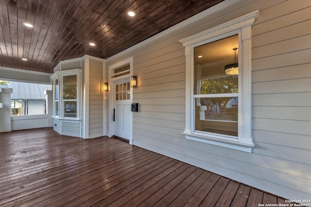 wooden deck featuring covered porch