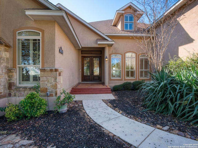 doorway to property featuring french doors