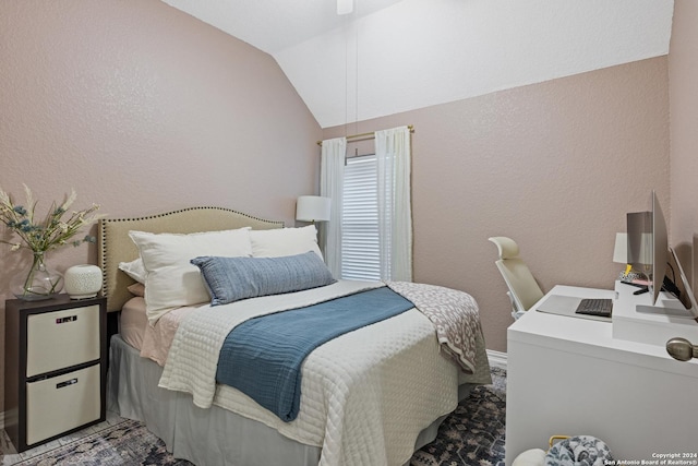 bedroom featuring vaulted ceiling