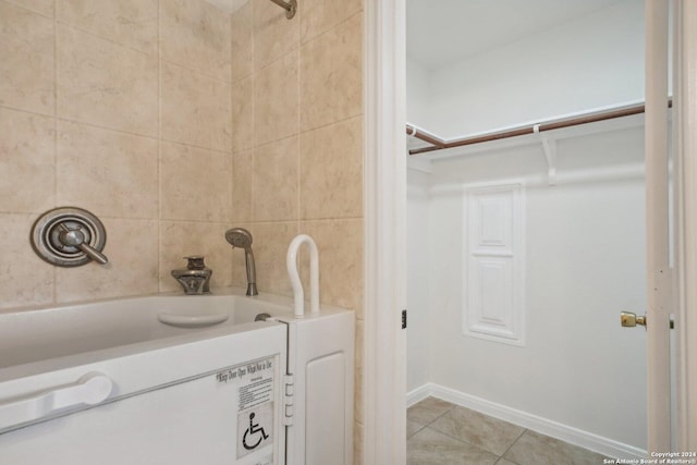 bathroom with tile patterned floors