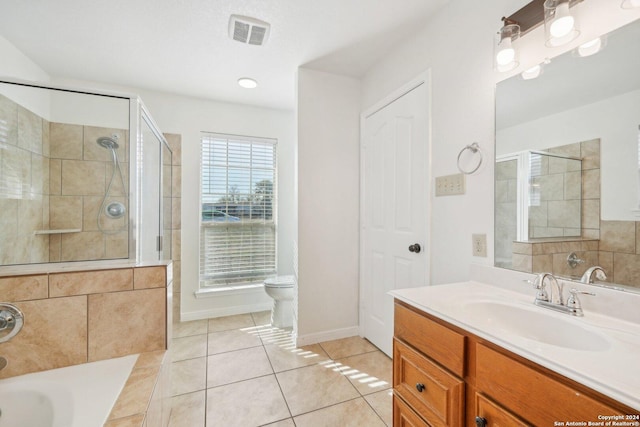 full bathroom with vanity, tile patterned flooring, plus walk in shower, and toilet