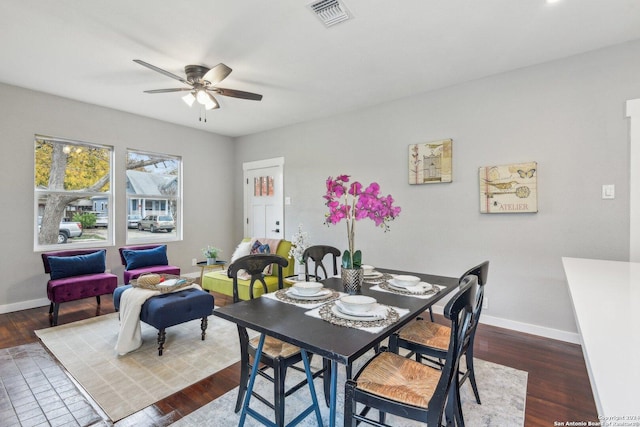 dining space featuring hardwood / wood-style floors and ceiling fan