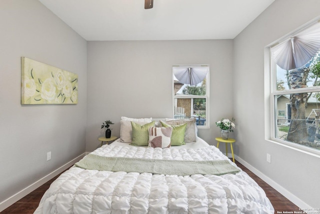 1750 W Mulberry Ave, San Antonio, TX 78201 - bedroom with dark wood-style floors and a ceiling fan