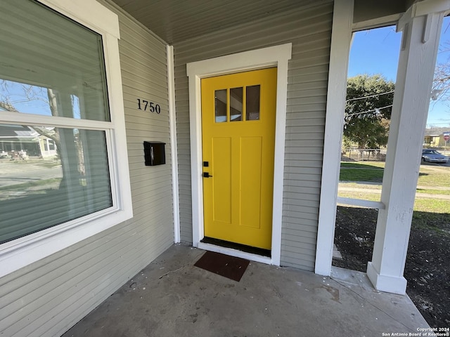 entrance to property with a porch