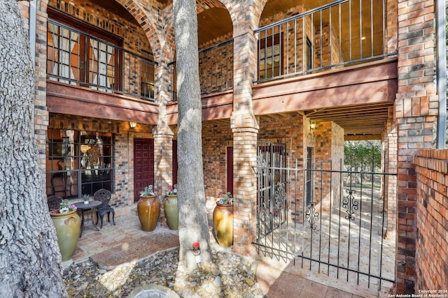 view of patio / terrace with a balcony