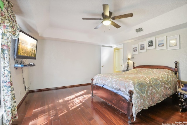 bedroom featuring wood-type flooring and ceiling fan