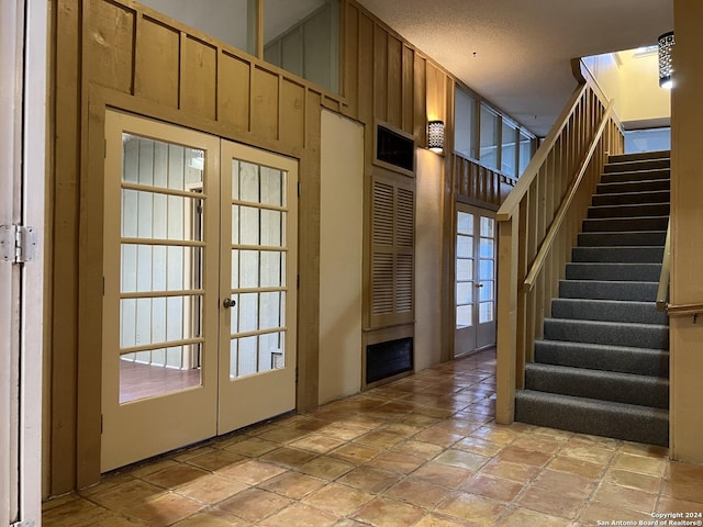 entryway featuring french doors