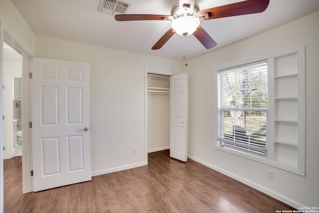 unfurnished bedroom featuring ceiling fan, a closet, and light hardwood / wood-style floors